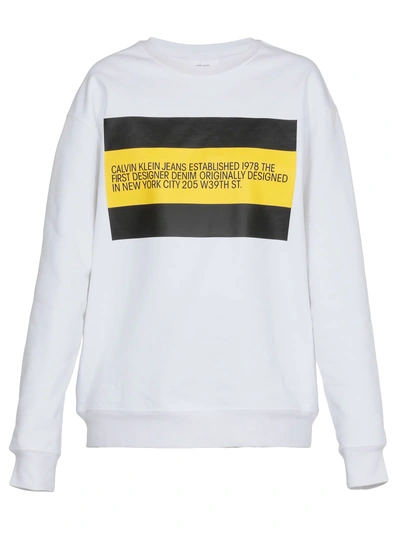 Shop Calvin Klein Oversize Sweatshirt In White / Black Yellow Flag