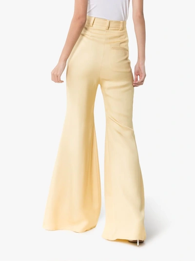 Shop Aleksandre Akhalkatsishvili High-waisted Flared Trousers In Yellow