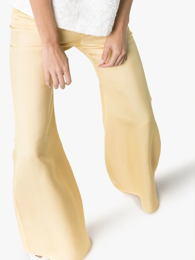 Shop Aleksandre Akhalkatsishvili High-waisted Flared Trousers In Yellow