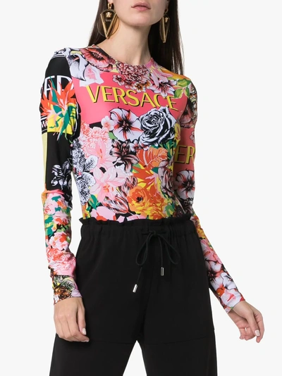 Shop Versace Floral Print Long Sleeve Bodysuit In A7000 Multicolor