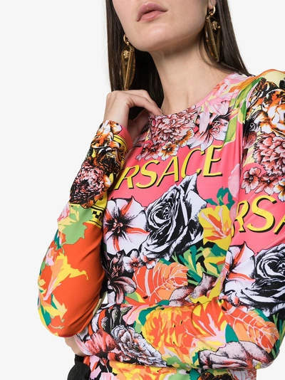 Shop Versace Floral Print Long Sleeve Bodysuit In A7000 Multicolor