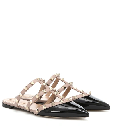Shop Valentino Rockstud Patent Leather Slippers In Black