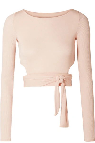 Shop Alo Yoga Cropped Cutout Stretch-modal Wrap Top In Pastel Pink