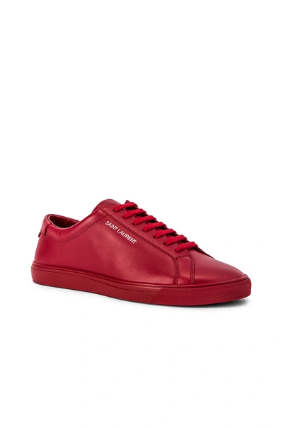 Shop Saint Laurent Andy Low Top Sneakers In Red.