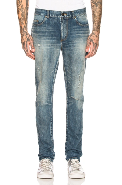 Shop Saint Laurent Low Waist Skinny Jeans In Denim Medium In Faded Medium Blue
