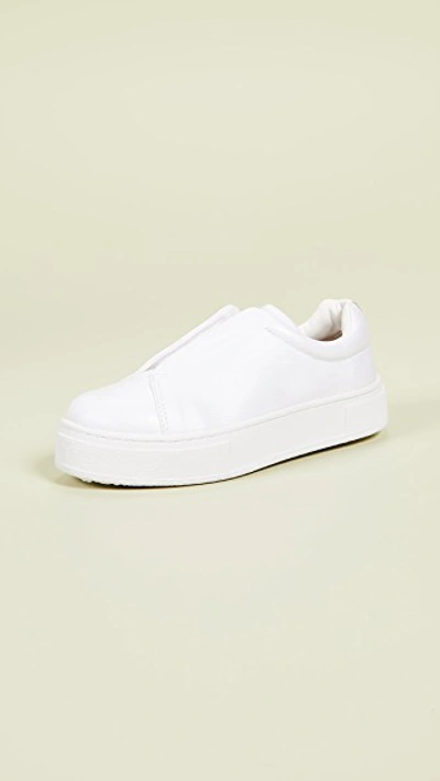 Shop Eytys Doja S-o Coated Sneakers In White