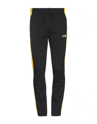 Shop Puma Casual Pants In Black