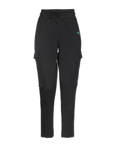 Shop Puma Casual Pants In Black