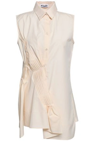 Shop Jil Sander Woman Asymmetric Pintucked Cotton-poplin Shirt Cream