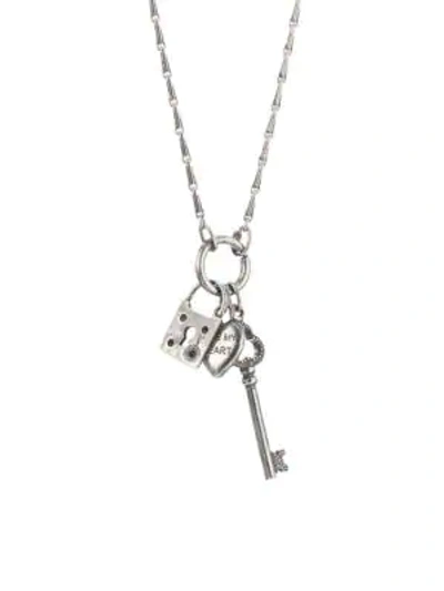 Shop Saint Laurent Triple Charms Secret Pendant Necklace In Old Silver