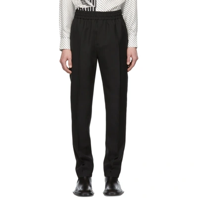 Shop Givenchy Black Wool Vertical Logo Jogger Trousers In 001 Black