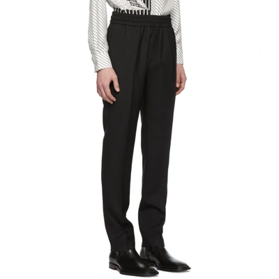Shop Givenchy Black Wool Vertical Logo Jogger Trousers In 001 Black