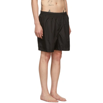 Shop Off-white Black Oversized Rubber Logo Swim Shorts