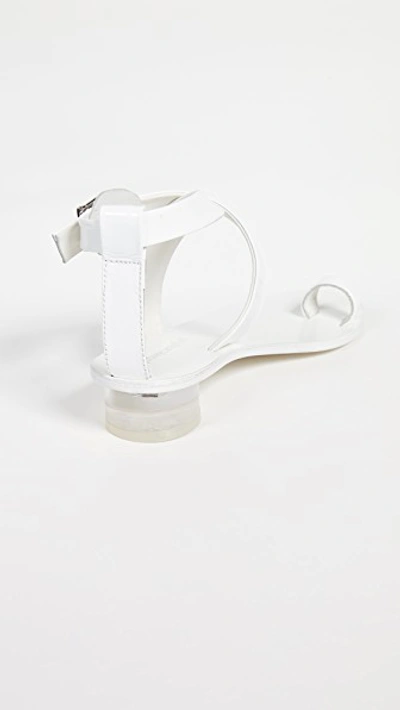 Shop Jeffrey Campbell Harlowe Strappy Sandals In White/clear
