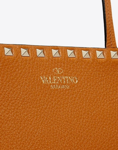 Shop Valentino Garavani Large Grain Calfskin Leather Rockstud Shopping Bag In Tan