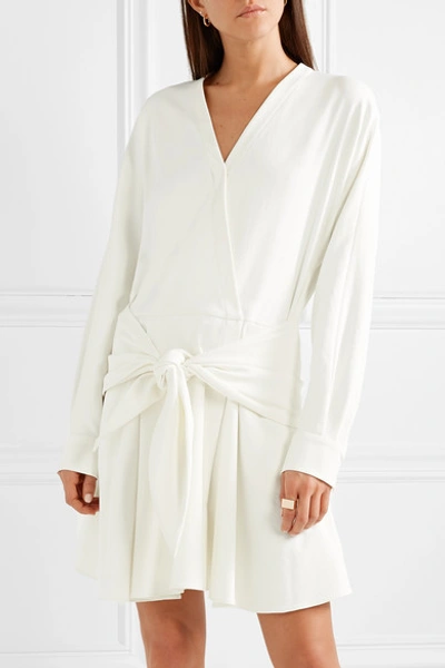 Shop Tibi Wrap-effect Tie-front Stretch-jersey Mini Dress In Ivory