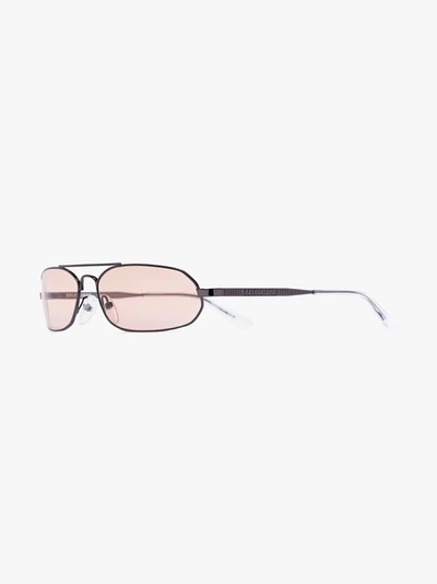 Shop Balenciaga Eyewear Ovale Sonnenbrille In Grey