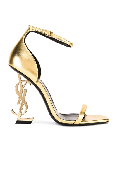Shop Saint Laurent Logo Ankle Strap Heel In Gold