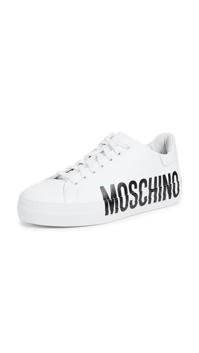 Shop Moschino Side Logo Sneakers In White