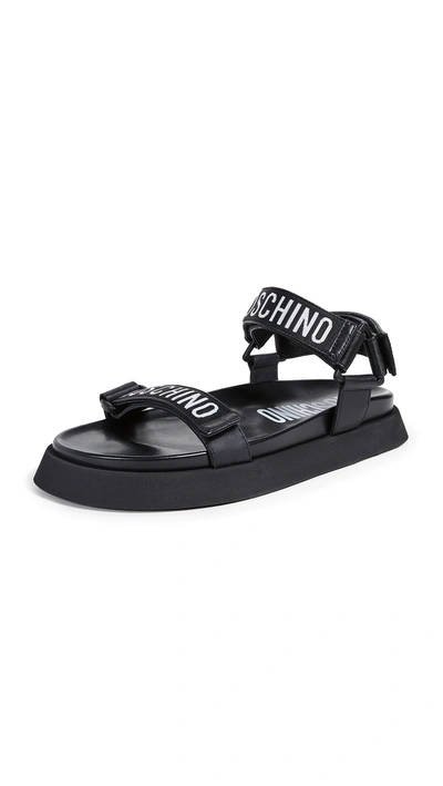 Shop Moschino Logo Velcro Strap Sandals In Black