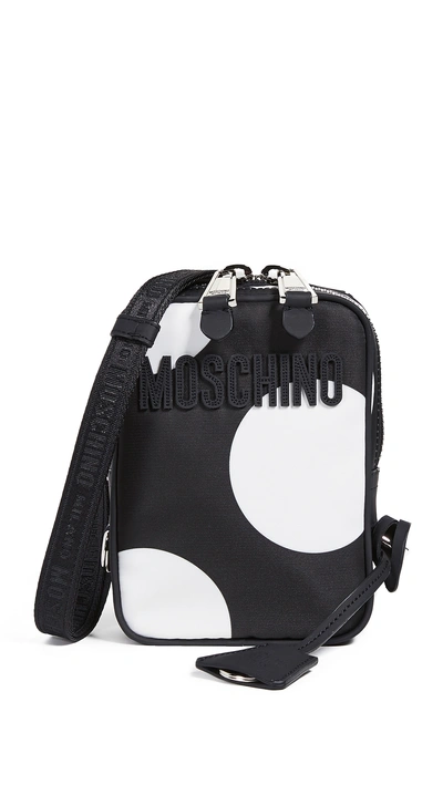 Shop Moschino Polka Dot Shoulder Bag In Black/white