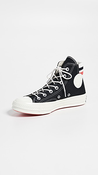 black converse with red stripe