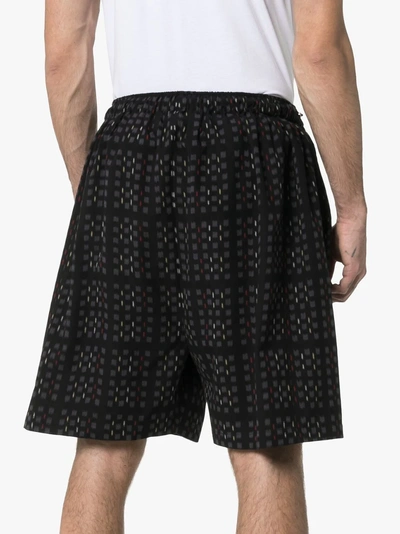 Shop Edward Crutchley Ikat Print Checked Drawstring Shorts In Black