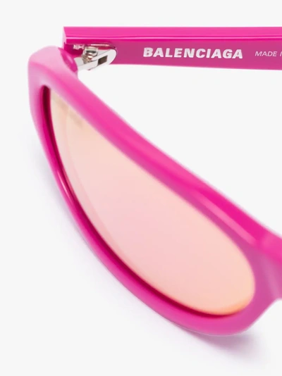 Shop Balenciaga Eyewear Pink Oval Sunglasses