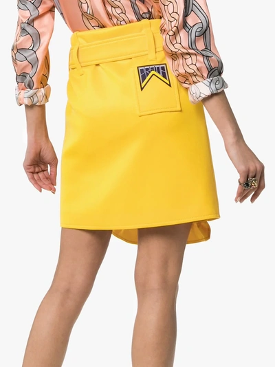Shop Prada Belted Ruffle Detail Skirt In Yellow