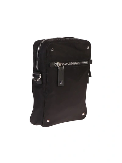 Shop Valentino Garavani Branded Crossbody Bag In Black