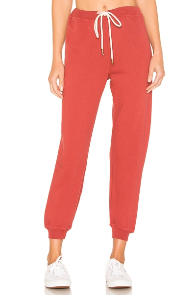 Shop The Great The Cropped Sweatpant In Brick Red