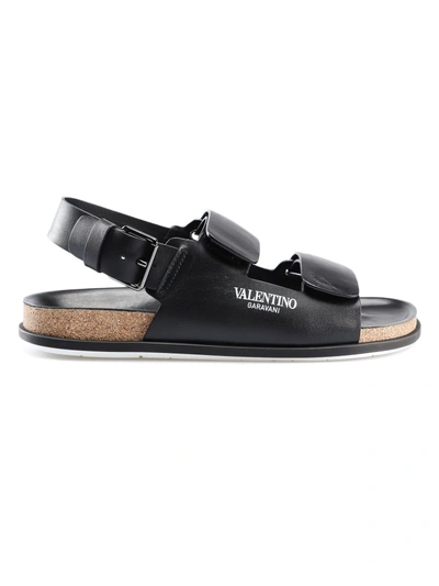 Shop Valentino Logo Print Sandals In No Black