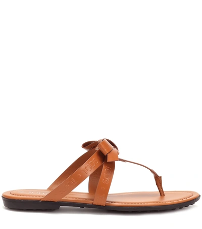 Shop Tod's Leather Thong Sandals In Brown