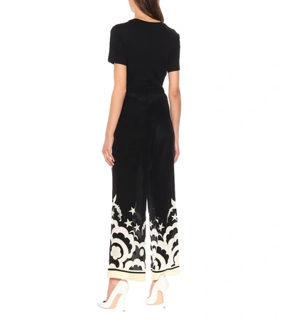 Shop Valentino Printed Silk Pants In Black