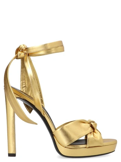 Shop Saint Laurent Knot Heeled Sandals In Gold