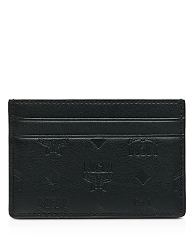 Shop Mcm Patricia Monogrammed Leather Card Case In Black/gold