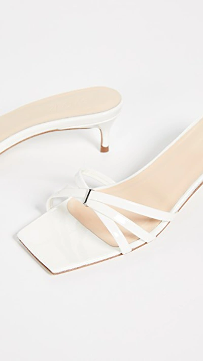 Shop By Far Libra Slides In White
