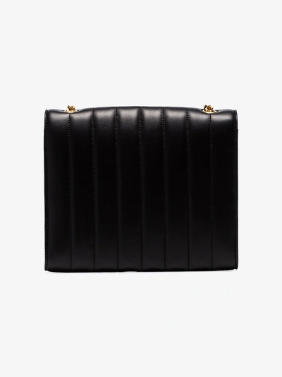 Shop Saint Laurent Black Vicky Monogram-embellished Leather Shoulder Bag In 1000 Black