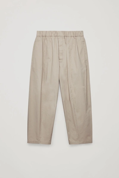 Shop Cos Elasticated Organic-cotton Trousers In Brown