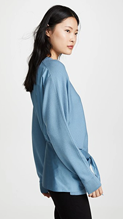 Shop Tibi Tie Peplum Woven Back Pullover In Chalk Blue