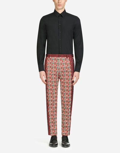 Shop Dolce & Gabbana Printed Stretch Cotton Pants With Bands In Red
