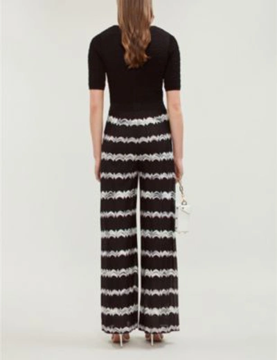 Shop Missoni Zigzag Stretch-knit Wide-leg Jumpsuit In Black