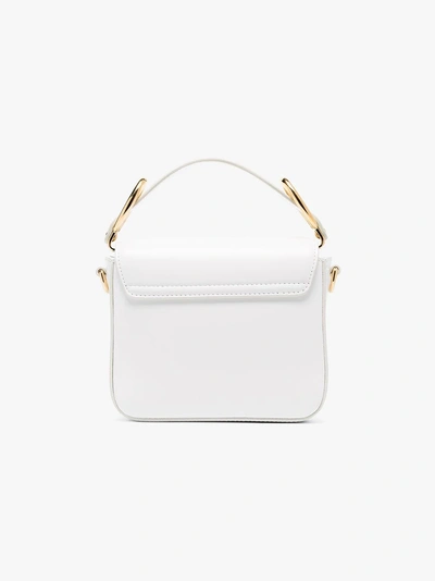 Shop Chloé White C Ring Leather Shoulder Bag In 100 Brilliant White