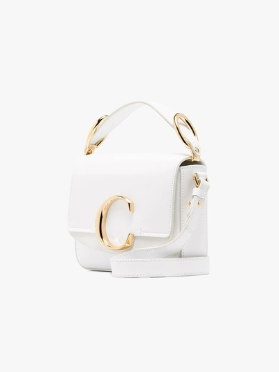 Shop Chloé White C Ring Leather Shoulder Bag In 100 Brilliant White