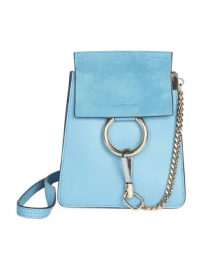 Shop Chloé Mini Faye Leather Bracelet Bag In Blue