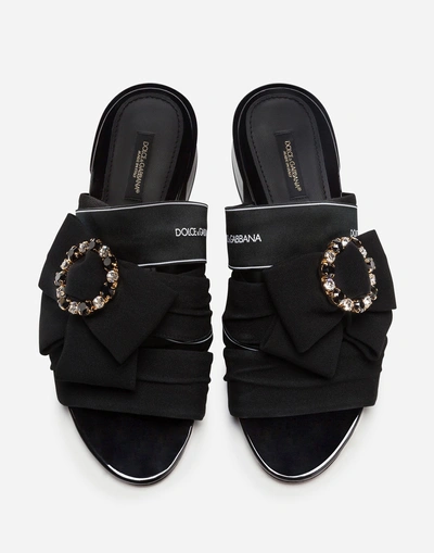 Shop Dolce & Gabbana Slides In Charmeuse With Bow And Crystals In Black