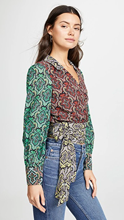 Shop Alice And Olivia Omega Blouson Sleeve Wrap Top In Small Crest Tile Black/bright