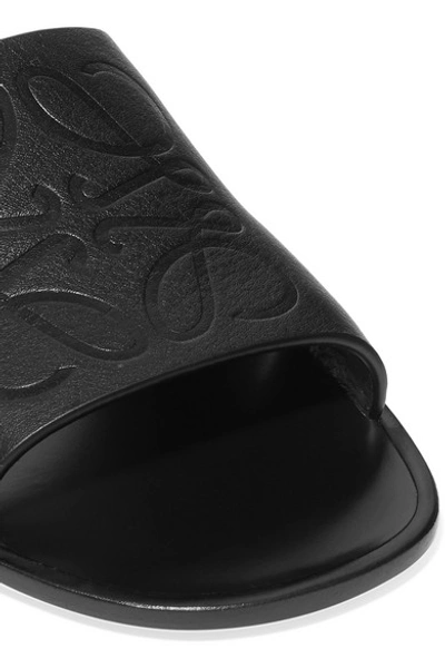 Shop Loewe Cutout Logo-embossed Leather Slides In Black
