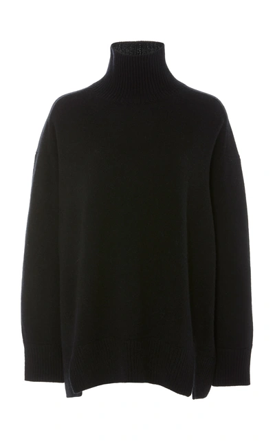 Shop Vince Oversized Cashmere Turtleneck Top In Black