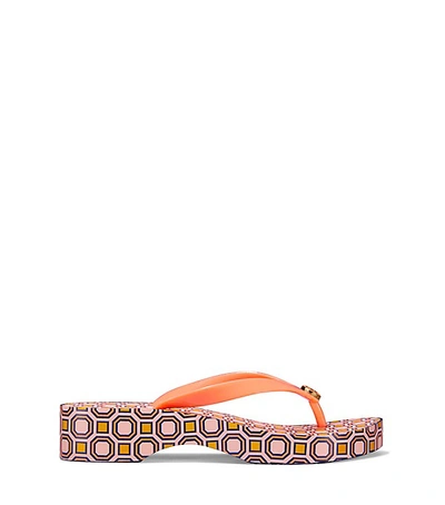 Shop Tory Burch Printed Carved Wedge Flip-flop In Fresh Melon/ballet Pink Octagon